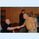 08 DNACO Bruce Miller greets members.jpg